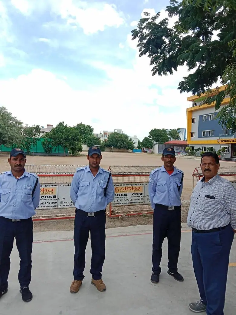 DBR security supervisor with his team of guards